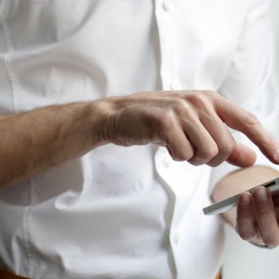 Man's hand on smart phone